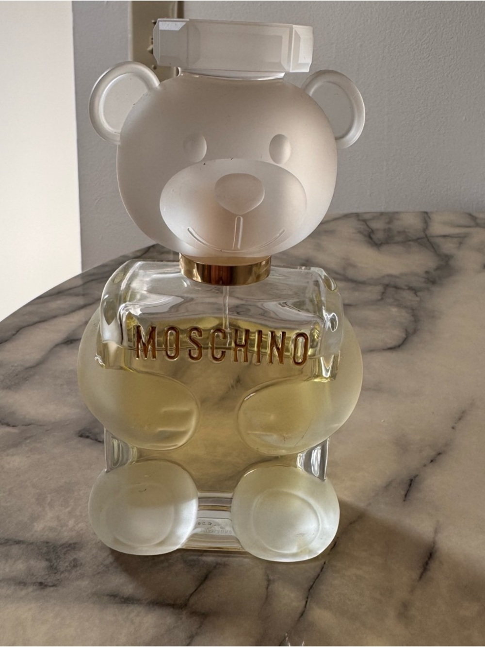 Moschino Teddy Bear Bottle in Frosted White with Gold Logo